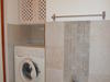 lavatrice nel bagno doccia